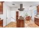 Eat-in kitchen featuring granite countertops and modern appliances at 6023 E 6Th Avenue Pkwy, Denver, CO 80220