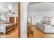 Spacious main bedroom with wood floors and vintage ceiling fan at 6023 E 6Th Avenue Pkwy, Denver, CO 80220