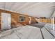 Covered patio with brick walls and concrete flooring at 914 Quari Ct, Aurora, CO 80011