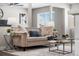 Living room with neutral decor and hardwood floors at 914 Quari Ct, Aurora, CO 80011