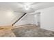 Spacious basement with stairs and potential for customization and ample room for storage at 3616 W Radcliff Ave, Denver, CO 80236