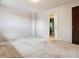 Spacious bedroom featuring a large window and neutral walls at 3616 W Radcliff Ave, Denver, CO 80236