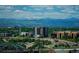 Amazing view of surrounding green spaces, buildings, roads and snow covered mountains at 1700 Bassett St # 1808, Denver, CO 80202