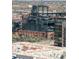 Vibrant city aerial showcases Rockies stadium behind a neighborhood of high-rise apartments at 1700 Bassett St # 1808, Denver, CO 80202