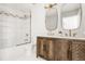 Stylish bathroom featuring a double vanity with modern fixtures and a glass-enclosed shower at 1700 Bassett St # 1808, Denver, CO 80202