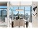 Bright dining area with floor to ceiling windows offering an expansive city view at 1700 Bassett St # 1808, Denver, CO 80202