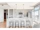 Modern kitchen featuring sleek cabinetry, stainless steel appliances, and a spacious island at 1700 Bassett St # 1808, Denver, CO 80202
