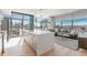 Bright living room featuring city views, modern furnishings, and a spacious open concept layout at 1700 Bassett St # 1808, Denver, CO 80202
