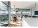 Open concept living space with a dining area, comfortable seating and a city view at 1700 Bassett St # 1808, Denver, CO 80202