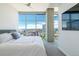 Bedroom with floor-to-ceiling windows showcasing scenic city views and modern interiors at 1700 Bassett St # 1808, Denver, CO 80202