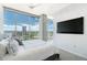 Bedroom with floor-to-ceiling windows and city views, offering ample natural light and a serene atmosphere at 1700 Bassett St # 1808, Denver, CO 80202