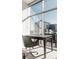 Modern office area bathed in sunlight, featuring a sleek desk and comfortable seating for work at 1700 Bassett St # 1808, Denver, CO 80202