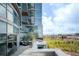 Expansive condo patio with city views and outdoor seating area in a modern building at 1700 Bassett St # 1808, Denver, CO 80202