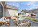 Outdoor patio area with neutral toned patio furniture and views of the backyard at 3205 E 102Nd Pl, Thornton, CO 80229