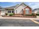 Charming home exterior with brick accents and well-maintained landscaping at 3205 E 102Nd Pl, Thornton, CO 80229