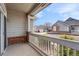Home's covered patio provides outdoor living space and neighborhood views at 3205 E 102Nd Pl, Thornton, CO 80229