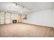 Finished basement features carpeted floors, a fireplace, and recessed lighting at 11196 E Baltic Dr, Aurora, CO 80014