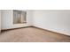 Empty bedroom with carpet and baseboard trim at 11196 E Baltic Dr, Aurora, CO 80014