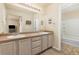 Bathroom with double sinks, a large mirror, and plenty of counter space at 217 Peabody St, Castle Rock, CO 80104