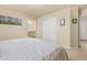 Spacious bedroom featuring carpet, a closet, and an ensuite bathroom for convenience at 217 Peabody St, Castle Rock, CO 80104