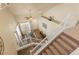 Entryway features hardwood floors, natural light, and a charming staircase at 217 Peabody St, Castle Rock, CO 80104