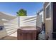 A close-up view of a hot tub with privacy screen in the backyard at 217 Peabody St, Castle Rock, CO 80104
