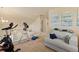 Cozy loft with neutral carpet, offering a relaxing and versatile space at 217 Peabody St, Castle Rock, CO 80104