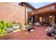 Charming brick patio with dining area and decorative plants at 4181 S Colorado Blvd, Cherry Hills Village, CO 80113