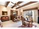 Charming bar area features a classic wood bar, beamed ceiling, and comfortable seating at 4181 S Colorado Blvd, Cherry Hills Village, CO 80113