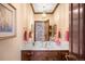 Elegant powder room boasting a unique sink, marble countertops, and ornate fixtures at 4181 S Colorado Blvd, Cherry Hills Village, CO 80113