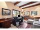 Well-lit office space featuring wood beams, wainscoting, and a comfortable seating area at 4181 S Colorado Blvd, Cherry Hills Village, CO 80113