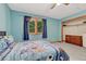 Bedroom with blue walls, a window, carpet, and a closet at 19149 E Ida Dr, Aurora, CO 80015