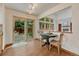 Cozy dining area features sliding glass doors to the backyard at 19149 E Ida Dr, Aurora, CO 80015