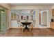 Cozy dining area overlooking the living area with fireplace at 19149 E Ida Dr, Aurora, CO 80015