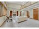 Spacious living room with high ceilings and brick fireplace at 19149 E Ida Dr, Aurora, CO 80015