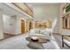 Bright living room featuring cathedral ceilings, an open layout to the kitchen and a view to the second floor at 19149 E Ida Dr, Aurora, CO 80015