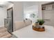 A dining area is visible from kitchen area with a view into the living room at 3613 S Sheridan Blvd # 11, Denver, CO 80235