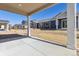 Serene covered patio offers an outdoor view of the community, inviting relaxation at 6554 N Malta St, Aurora, CO 80019