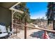 Outdoor deck showing scenic views surrounded by nature at 24949 N Mountain Park Dr, Evergreen, CO 80439