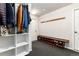 Functional mudroom with built-in storage, a coat rack, and shoe cubbies at 24949 N Mountain Park Dr, Evergreen, CO 80439