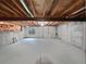 Unfinished basement with high ceilings and ample space at 7770 W 90Th Dr, Broomfield, CO 80021