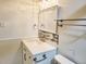 Bathroom vanity with white stone countertop, backsplash accent, and modern fixtures at 715 S Alton Way # 10A, Denver, CO 80247