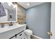 Basement bathroom with updated vanity and fixtures at 5737 S Odessa St, Centennial, CO 80015