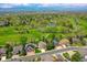 Breathtaking aerial view of a lush golf course and neighborhood at 9430 Perry St, Westminster, CO 80031