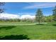 Beautiful green golf course landscape with lush green grass at 9430 Perry St, Westminster, CO 80031