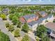 Aerial view of a residential neighborhood showcasing tree-lined streets and meticulously maintained homes at 11791 Bradburn Blvd, Westminster, CO 80031