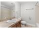 Clean bathroom featuring neutral finishes, tile accents, and built-in towel bar at 11791 Bradburn Blvd, Westminster, CO 80031