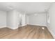 Bright, airy bedroom with light-colored wood-look floors and ample natural light at 11791 Bradburn Blvd, Westminster, CO 80031