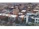 Aerial view of the property and surrounding neighborhood buildings at 65 N Logan St # B4, Denver, CO 80203