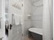 Bathroom with clawfoot tub, white subway tile, and updated fixtures at 65 N Logan St # B4, Denver, CO 80203